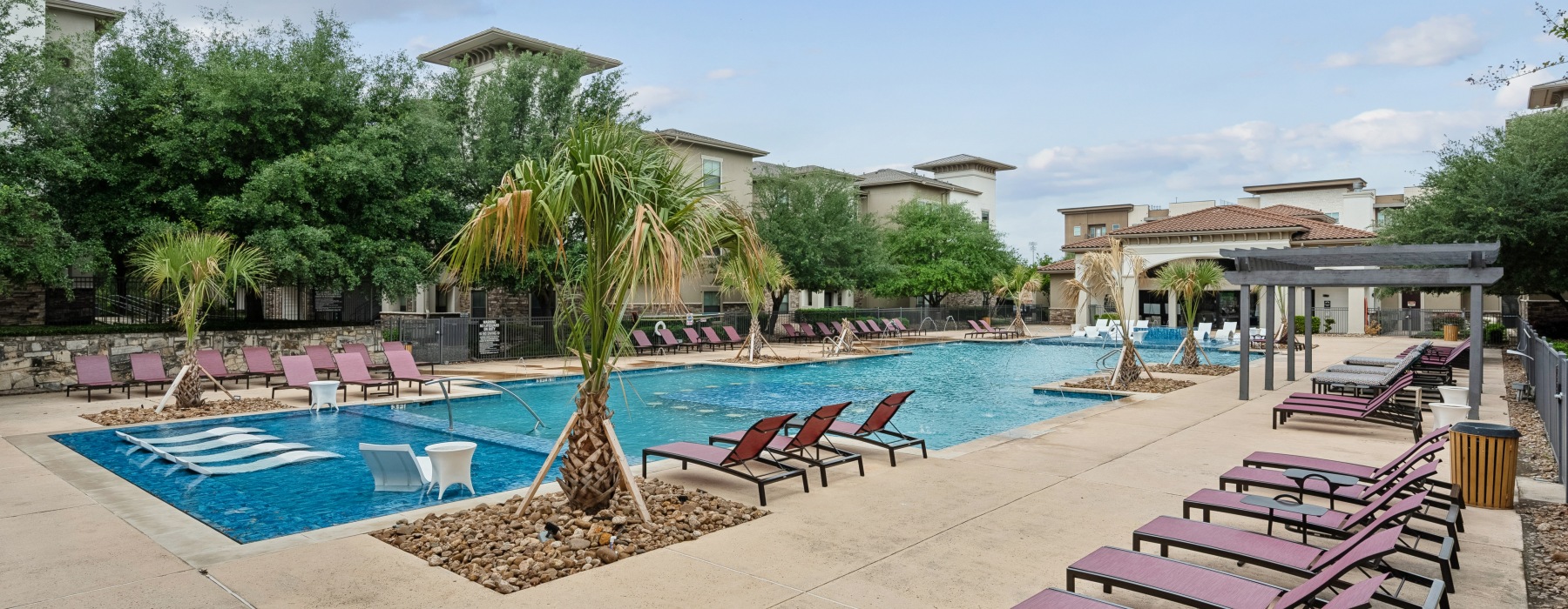 a swimming pool in front of a building